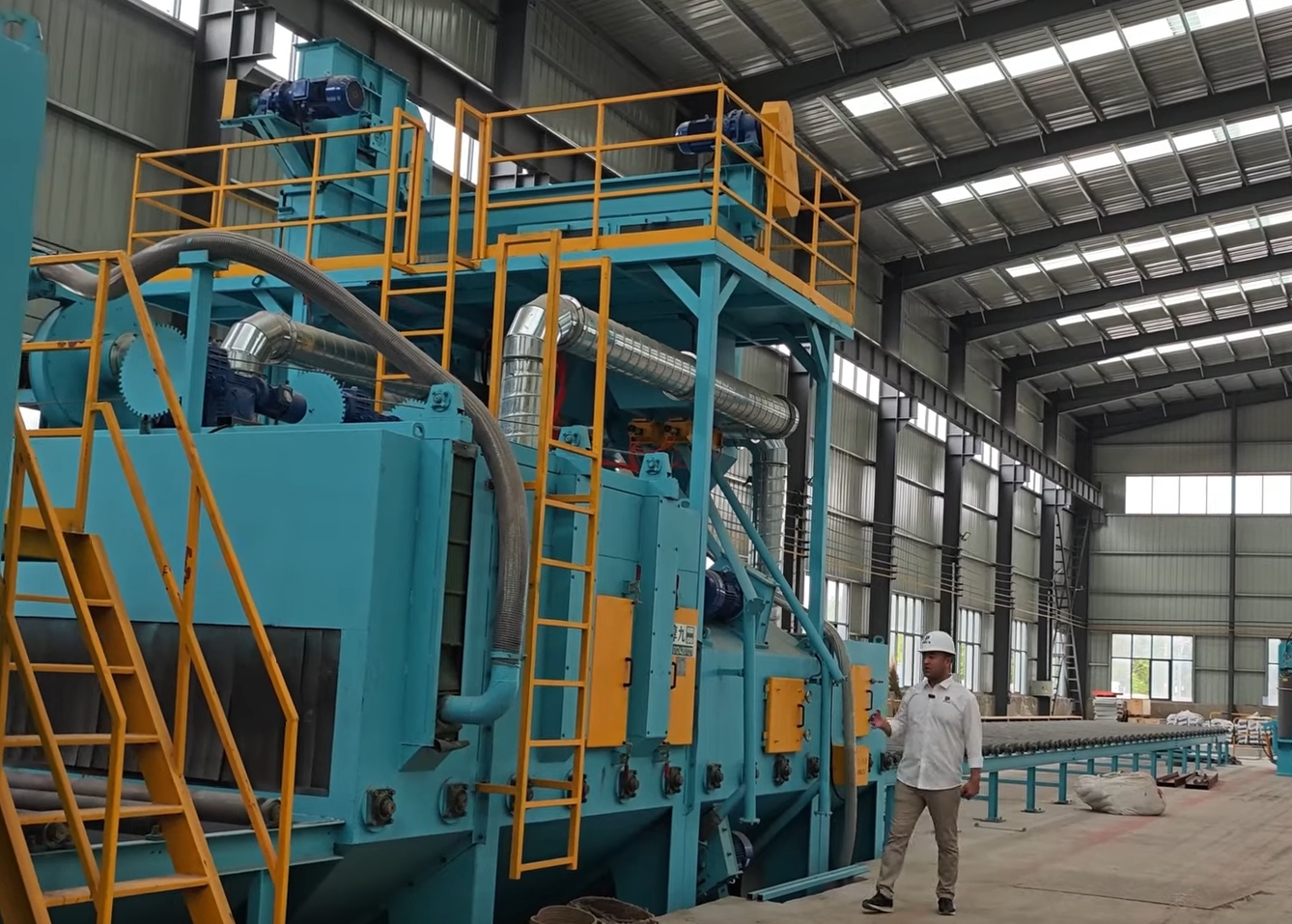 Introduction To Suitong Crane Crane Steel Shot Blasting Spraying Production Line